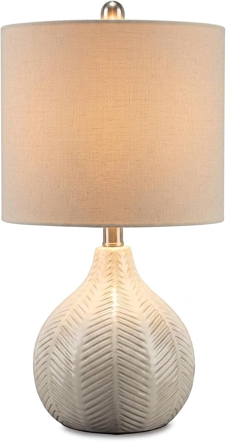 Signature Design by Ashley Rainermen Casual Ceramic Table Lamp, Transparent White Glaze Finish, Drum Hardback Fabric Shade, 11″ W x 11″ D x 21″ H, Off White